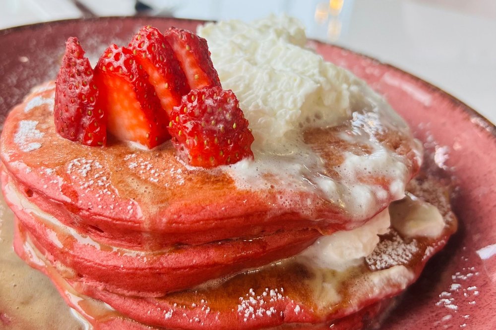 Pink velvet pancakes with strawberries and whipped mascarpone