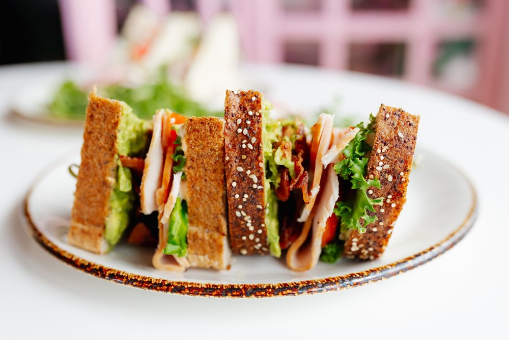 Club sandwich on seeded bread
